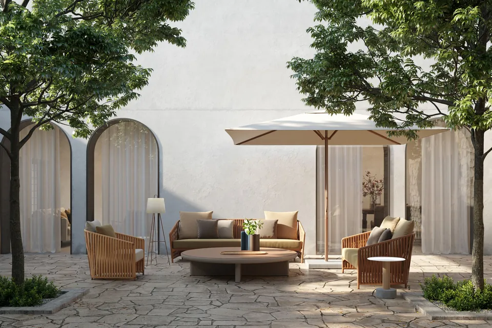 Kettal Bitta Lounge outdoor furniture in use, catalog photograph