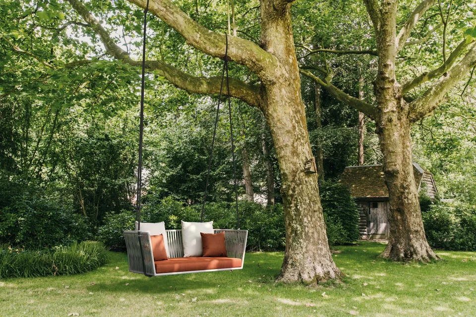 Kettal Bitta outdoor furniture in use, catalog photograph