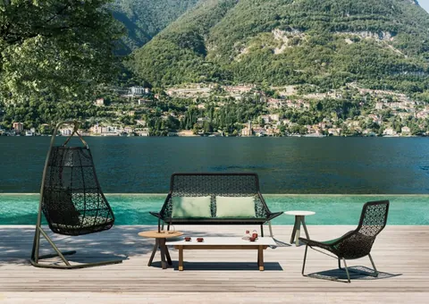 Kettal Maia outdoor furniture in use, catalog photograph