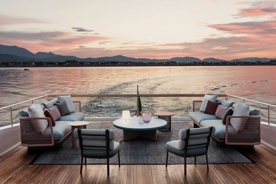 Kettal Mesh outdoor furniture in use, catalog photograph