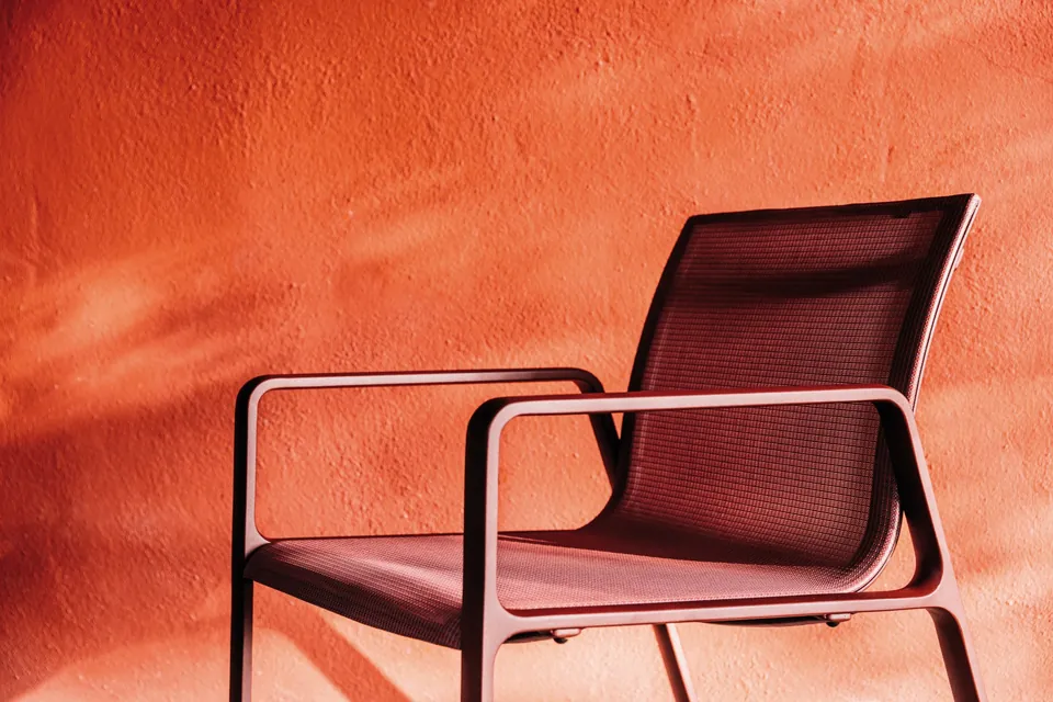 Kettal Park Life outdoor furniture in use, catalog photograph