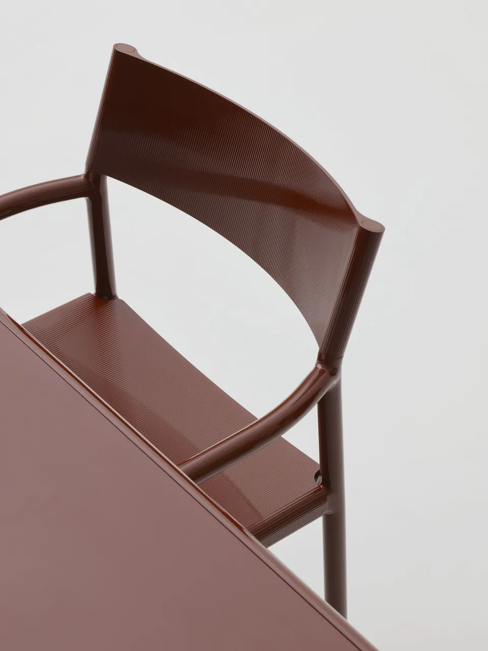 Kettal Passage outdoor furniture in use, catalog photograph