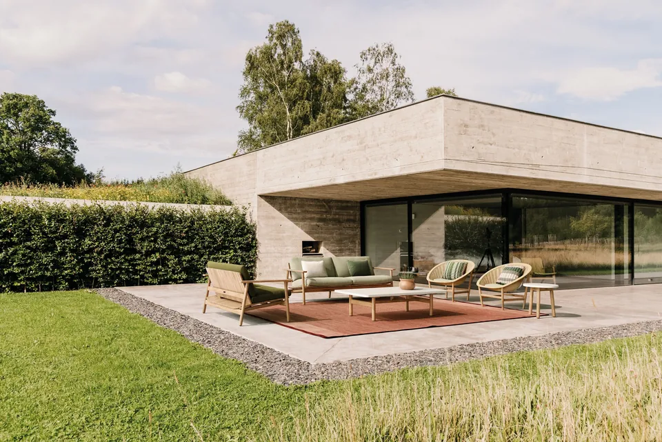 Kettal Riva outdoor furniture in use, catalog photograph