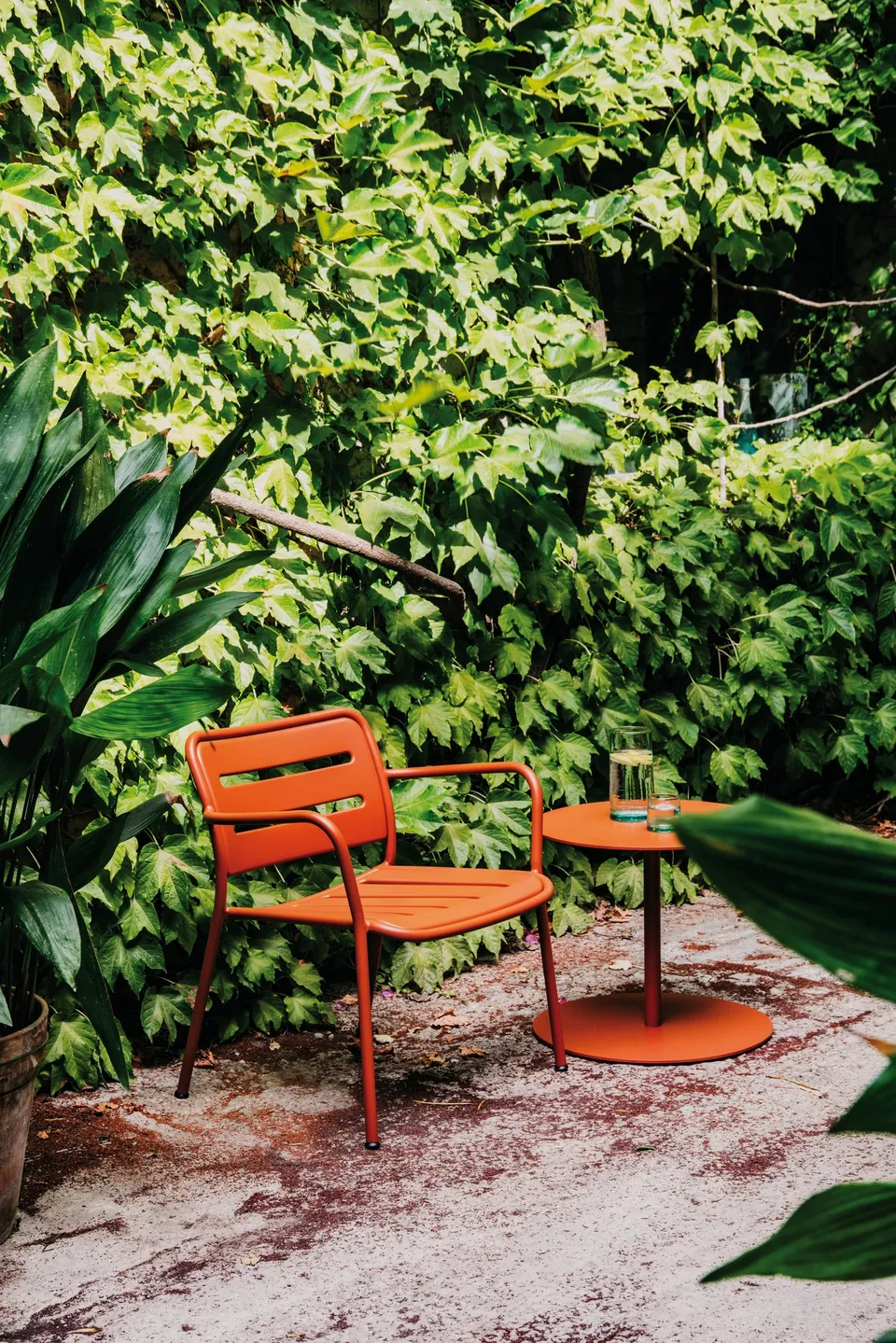 Kettal Village outdoor furniture in use, catalog photograph